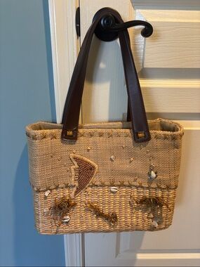 Handcrafted Natural Straw Tote Bag with Brown Leather Handles